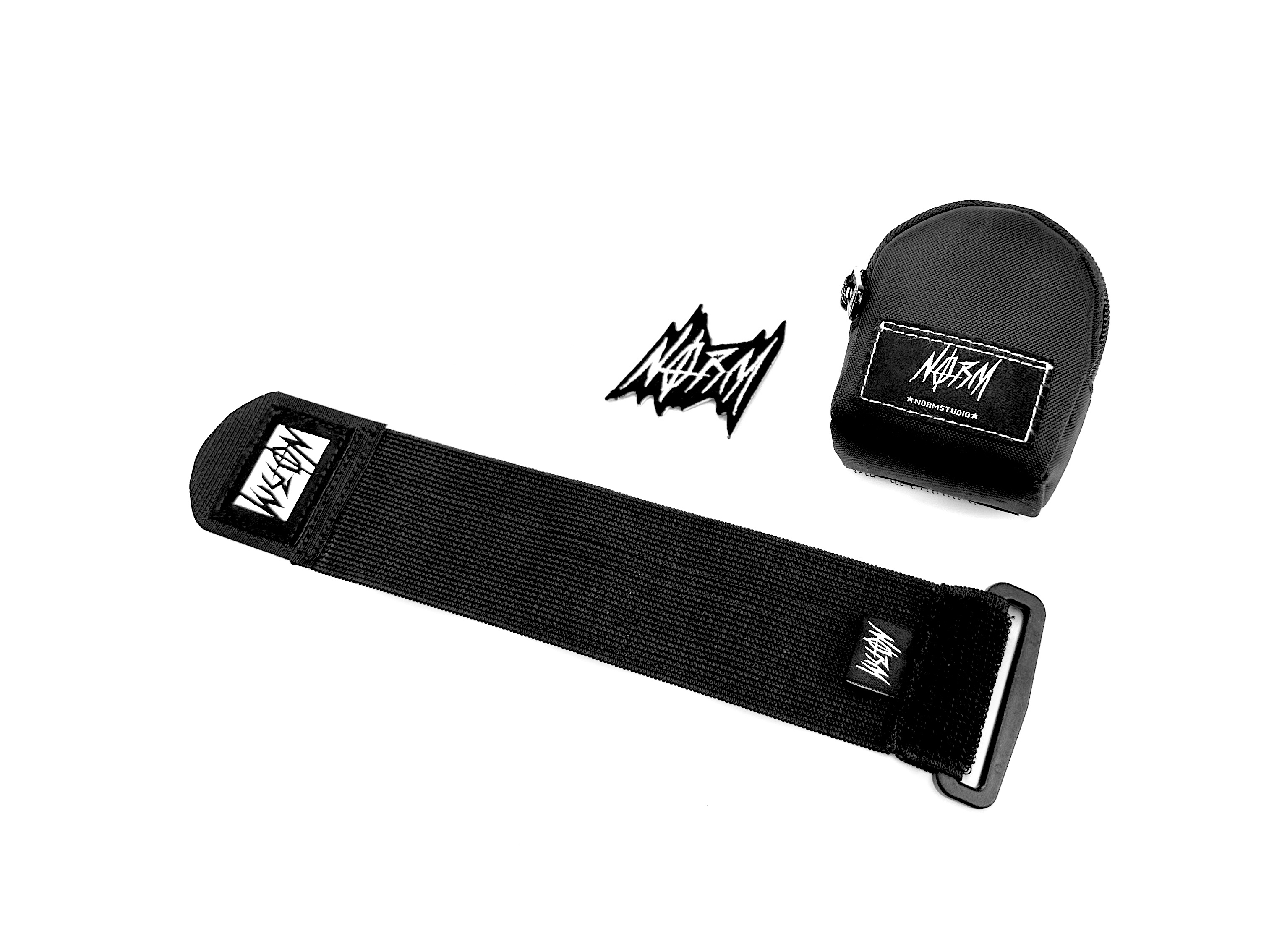 NORM "EM" WRIST BAG + 1 Signature Logo Badge