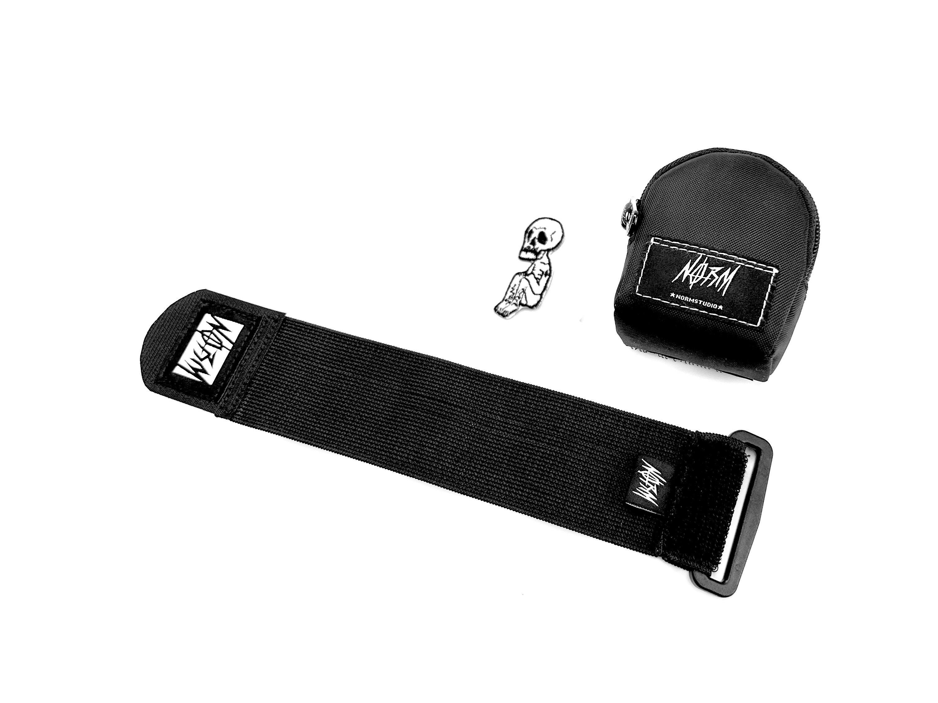 NORM "EM" WRIST BAG + 1 Skullface Badge